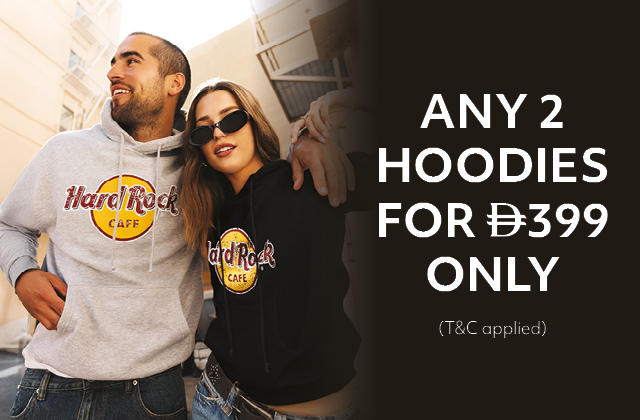 a man and woman wearing hoodies