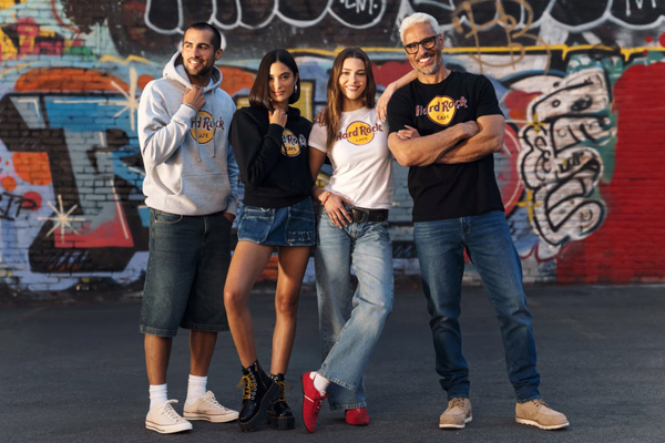 a group of men and women wearing Hard Rock T-shirts
