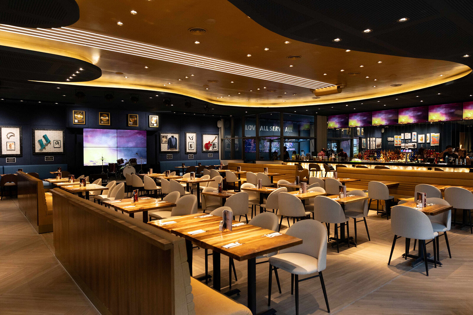 a restaurant with tables and chairs