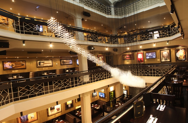 Interior of Hard Rock Cafe Prague featuring a floating guitar