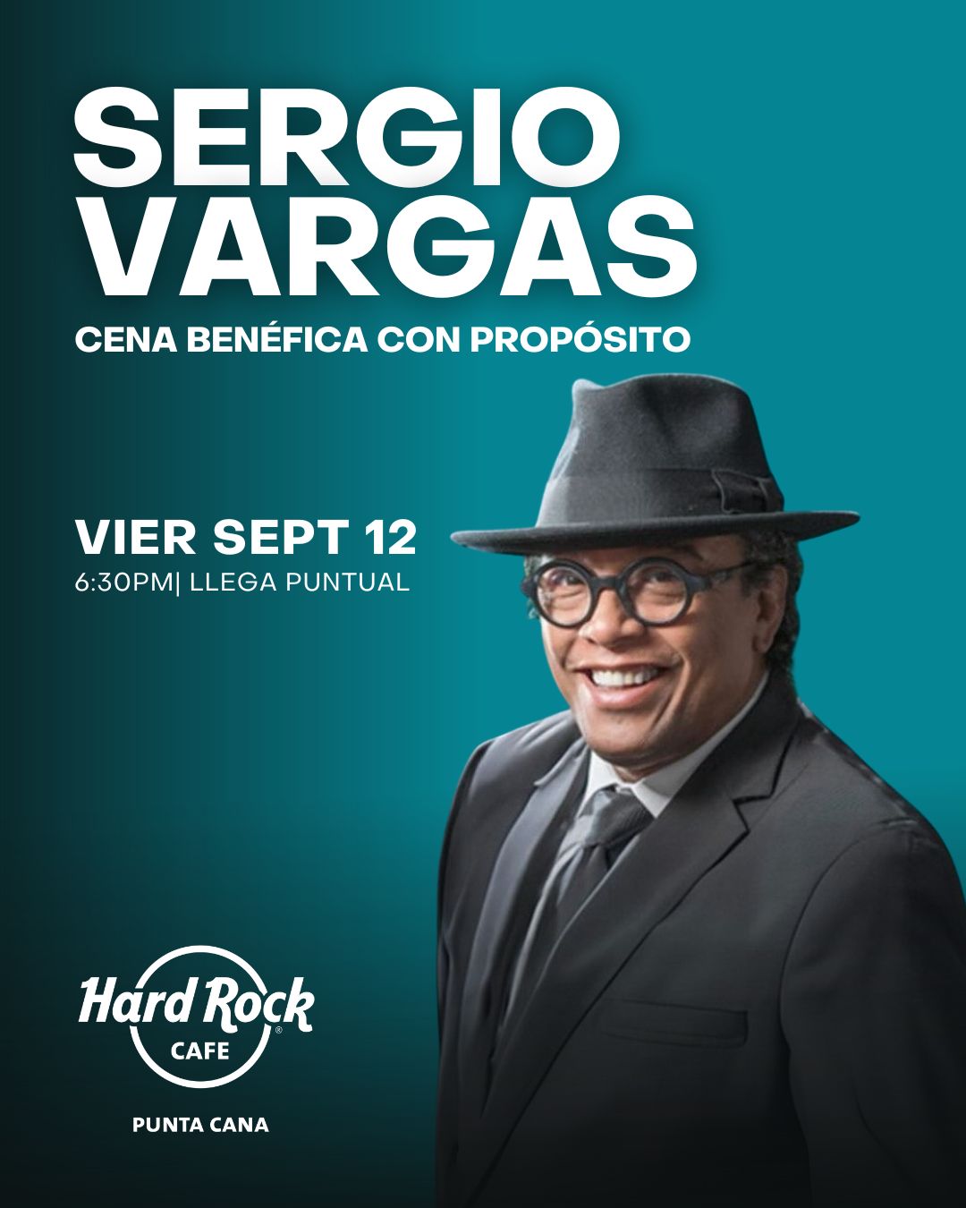 a man in a suit and hat