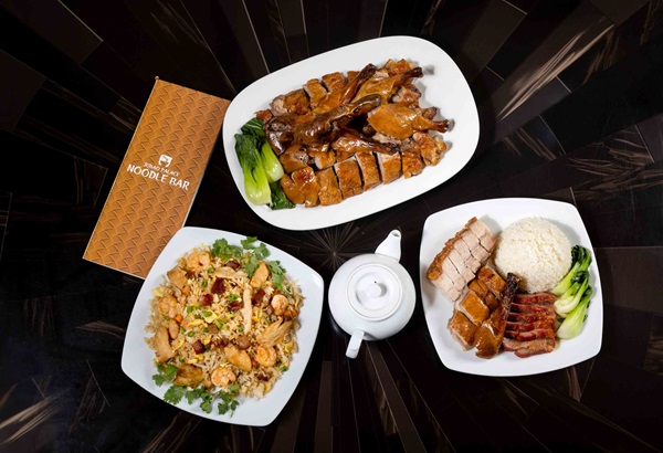 Table of Food at Jubao Palace Noodle Bar