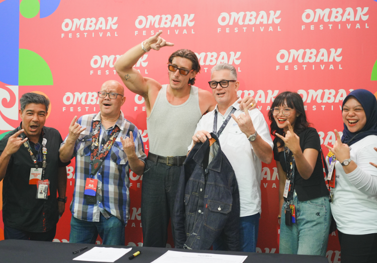 a group of people posing for a photo